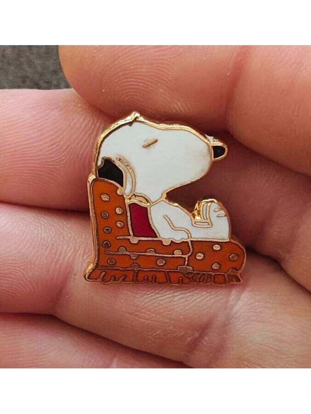 1970s Aviva Peanuts Snoopy in Orange Armchair Cloisonne Gold Tone Enamel Pin